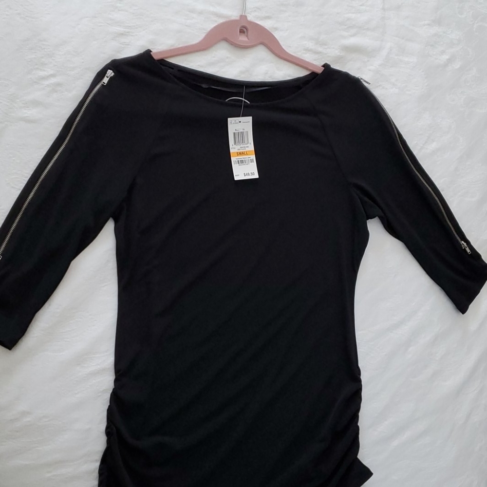 INC top with 3/4 sleeves and working zippers. Sz.S
